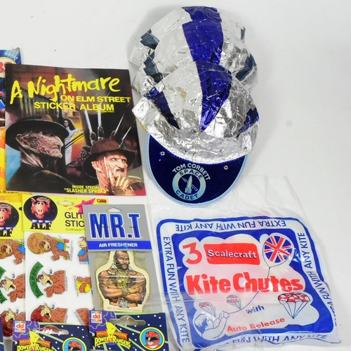 618 - A collection of vintage childrens rack pack toys and merchandise to include; Power Rangers mini back... 