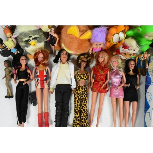 624 - A large collection of assorted vintage toys, including action figures and dolls, featuring from bran... 