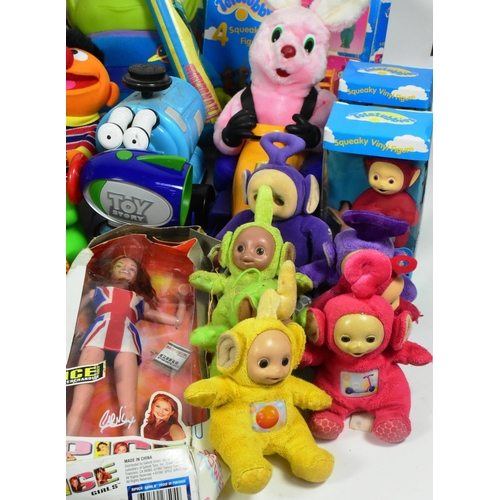 624 - A large collection of assorted vintage toys, including action figures and dolls, featuring from bran... 