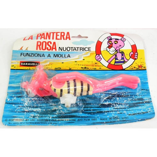 641 - The Pink Panther - x2 vintage 1980s French made Pink Panther toys comprising a rack pack wind up Pin... 