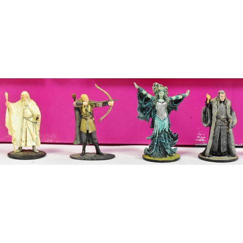 669 - Lord Of The Rings - a large collection of New Line Cinema LOTR Lord Of The Rings collectible chess f... 