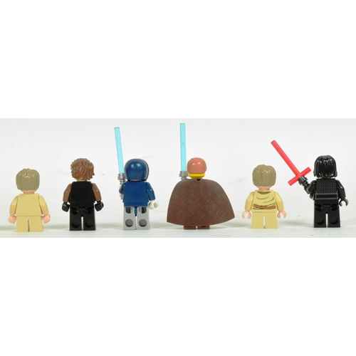 672 - Lego - a collection of x12 original Lego Star Wars Anakin Skywalker minifigures.