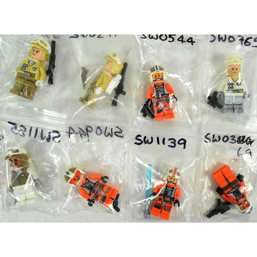 716 - Lego - a collection of x30 Lego Star Wars minifigures to include; Wedge Antilles, Luke Skywalker, 
 ... 