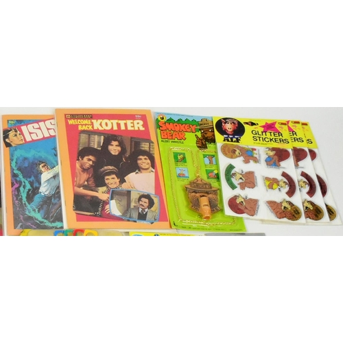 717 - A collection of vintage childrens rack pack toys to include; Doctor Who Mega Monster Army, Smokey Be... 