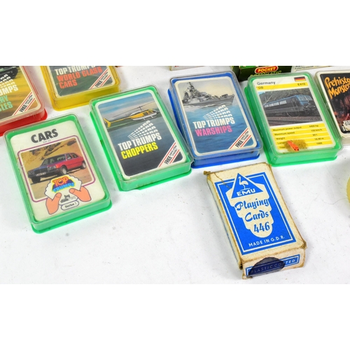 727 - Retro Toys - a selection of vintage c1970s toys and playsets to include several sets of Top Trumps c... 