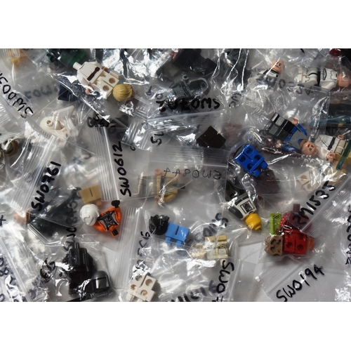 740 - Lego - a LARGE collection of assorted Lego Star Wars minifigures parts / spares in various degree of... 