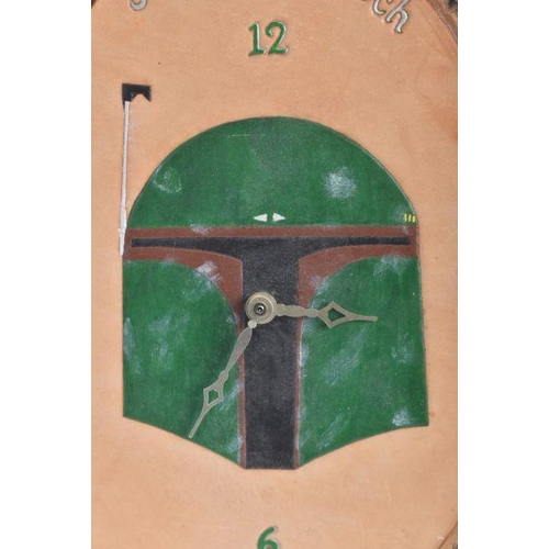 768 - Estate of Jeremy Bulloch - Star Wars - a fan-made clock featuring Boba Fett to the centre. Worked sh... 