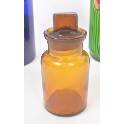 11 - A collection of three vintage 20th century chemists / apothecary medicine glass bottles. Cobalt blue... 