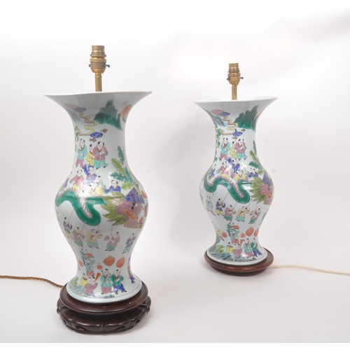 13 - A pair of vintage 20th century Chinese hand painted ceramic converted lamp vases. With light fixings... 