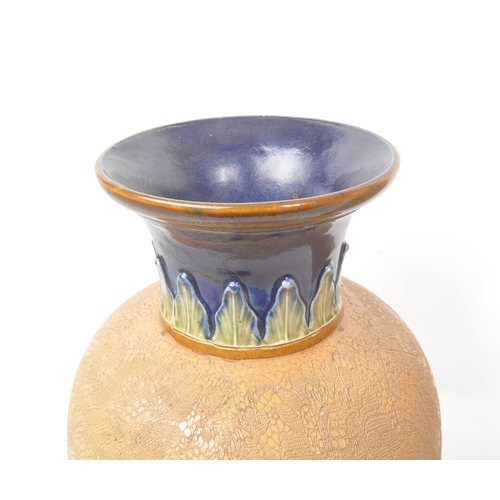 15 - Royal Doulton - Lambeth - A pair of 19th century ceramic pottery table vases. Having a flared rim wi... 