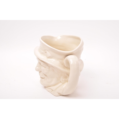 18 - Royal Doulton - A mid 20th century Charles Noake for Royal Doulton Simon the Cellarer character jug.... 