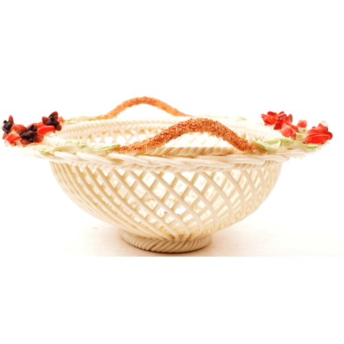 2 - Belleek - Irish Porcelain - An early 20th century woven fuchsia basket. With intricate weave detail,... 