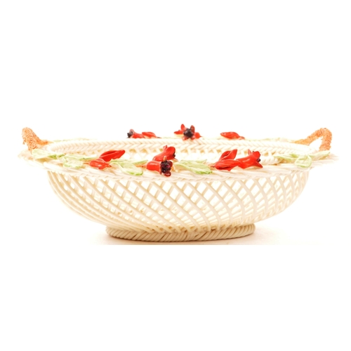2 - Belleek - Irish Porcelain - An early 20th century woven fuchsia basket. With intricate weave detail,... 