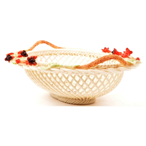 2 - Belleek - Irish Porcelain - An early 20th century woven fuchsia basket. With intricate weave detail,... 