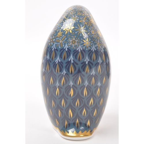 22 - Royal Crown Derby - Contemporary-Paper weight in the form of a penguin. Gilt stopper and makers mark... 