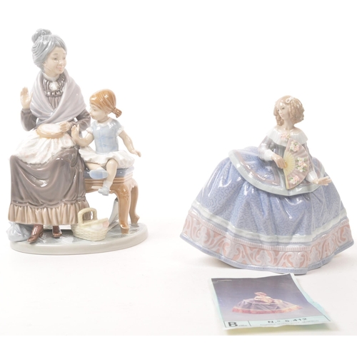 29 - Lladro - Late 20th century Spanish porcelain figurines. A ballroom lady with delicate decorated fan ... 