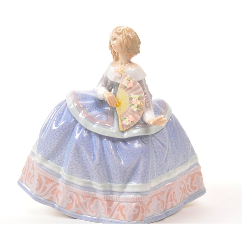 29 - Lladro - Late 20th century Spanish porcelain figurines. A ballroom lady with delicate decorated fan ... 