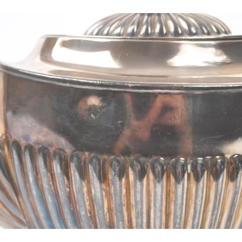 33 - Art Deco early 20th century silver plate tea service set. Comprising of hot water jug, teapot and tw... 