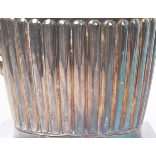 33 - Art Deco early 20th century silver plate tea service set. Comprising of hot water jug, teapot and tw... 