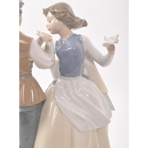 34 - Lladro - Late 20th century Spanish porcelain figure. Hand painted muted colourway tones to the glaze... 
