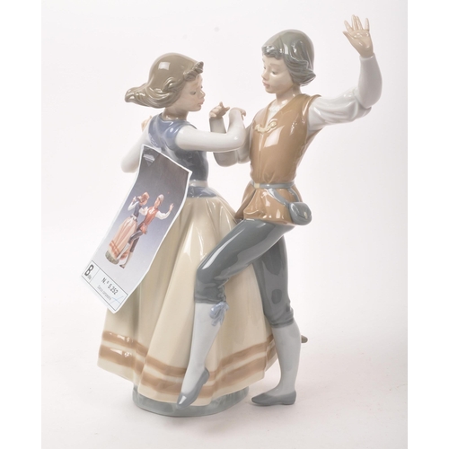 34 - Lladro - Late 20th century Spanish porcelain figure. Hand painted muted colourway tones to the glaze... 