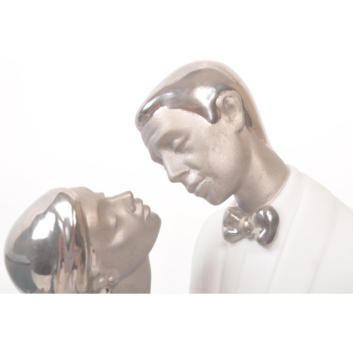 35 - Lladro - A Lladro Happy Anniversary (Feliz Aniversario) Re-Deco porcelain figure. The figure depicti... 