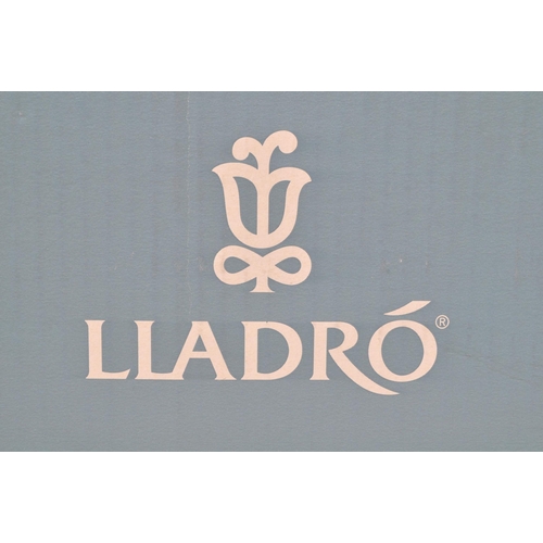 35 - Lladro - A Lladro Happy Anniversary (Feliz Aniversario) Re-Deco porcelain figure. The figure depicti... 