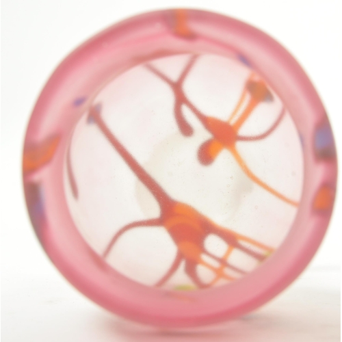 38 - A set of three 20th century studio art glass hand blown stemmed glasses. Each glass raised on a roun... 