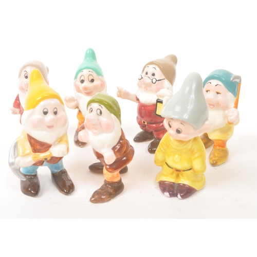 42 - Disney - 20th Century - A collection of ceramic, hand painted Disney figurines in the form of Cinder... 