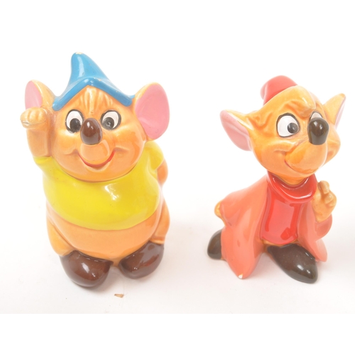 42 - Disney - 20th Century - A collection of ceramic, hand painted Disney figurines in the form of Cinder... 