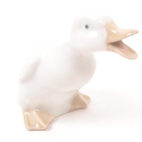 44 - Nao by Lladro - 20th Century - A collection of Spanish porcelain hand painted figurines modelled in ... 