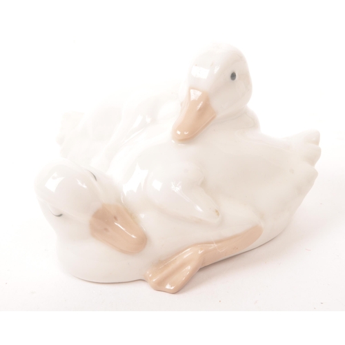 44 - Nao by Lladro - 20th Century - A collection of Spanish porcelain hand painted figurines modelled in ... 