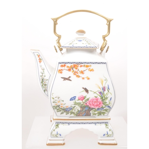 46 - Franklin Mint - A 1980s Franklin Mint Birds and Flowers of the Orient teapot, alongside a Franklin M... 