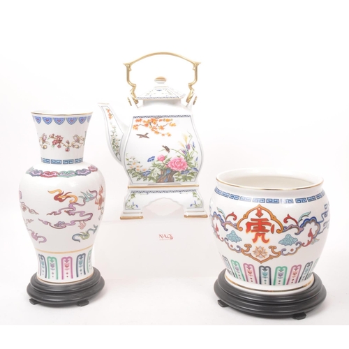 46 - Franklin Mint - A 1980s Franklin Mint Birds and Flowers of the Orient teapot, alongside a Franklin M... 