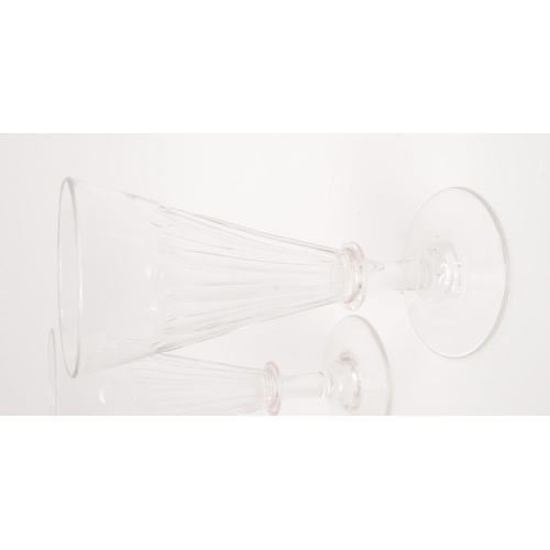 5 - George III 19th century four drinking / display glasses. With conical tapering reeded bowl into a si... 