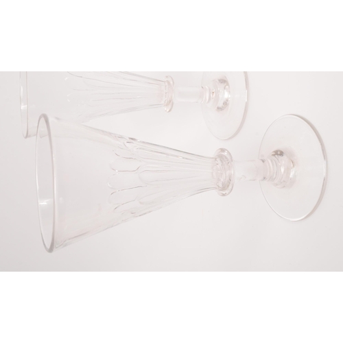 5 - George III 19th century four drinking / display glasses. With conical tapering reeded bowl into a si... 