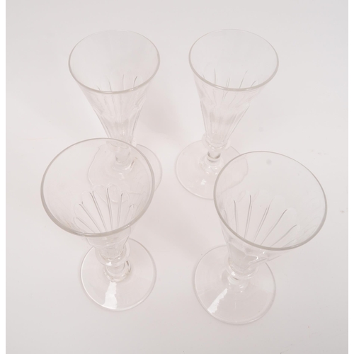 5 - George III 19th century four drinking / display glasses. With conical tapering reeded bowl into a si... 