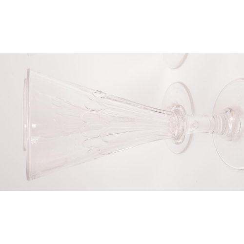 5 - George III 19th century four drinking / display glasses. With conical tapering reeded bowl into a si... 