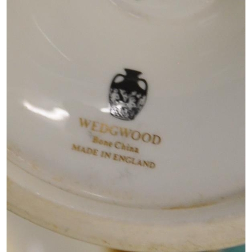 50 - A collection of four Chinese ceramic mud men figurines. Each of the figures on naturalistic bases, w... 