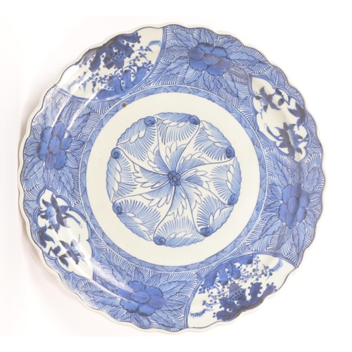 56 - A large vintage 20th century circa 1930s Chinese Asian blue and white ceramic pottery charger. With ... 
