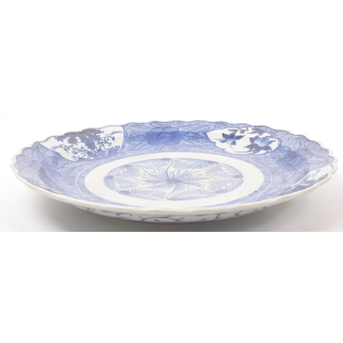 56 - A large vintage 20th century circa 1930s Chinese Asian blue and white ceramic pottery charger. With ... 