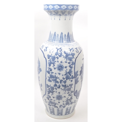 57 - A large Chinese floor standing vase. The vase having a rounded base with tapered rounded body, and n... 