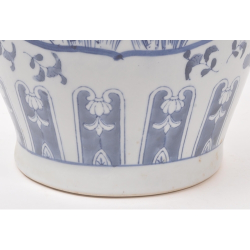 57 - A large Chinese floor standing vase. The vase having a rounded base with tapered rounded body, and n... 