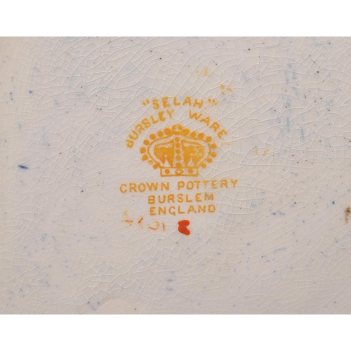 9 - A large 20th century Crown Pottery Bursley Ware Selah pattern jug. The jug having blue glaze with pa... 