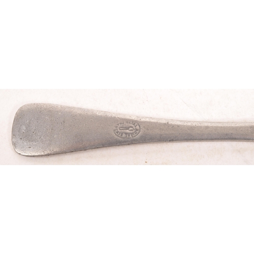45a - A late 19th century French white metal absinthe spoon. The spoon having a pierced basin with a handl... 