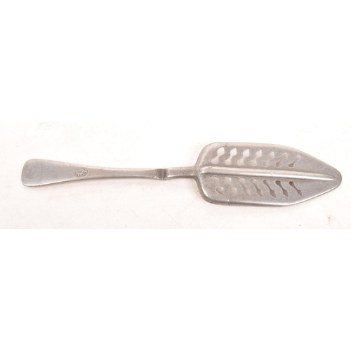 45a - A late 19th century French white metal absinthe spoon. The spoon having a pierced basin with a handl... 