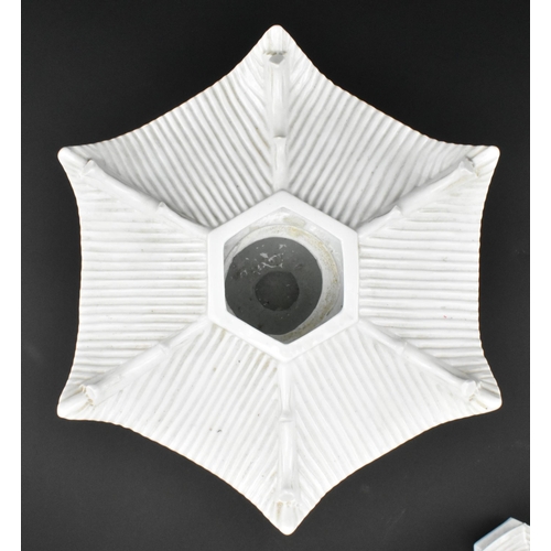 104 - A Chinese Qing Dynasty late 19th / early 20th century blanc de chine glazed ceramic pagoda tripod in... 