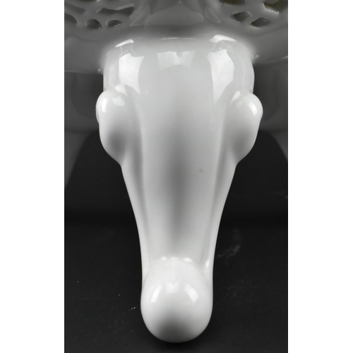 104 - A Chinese Qing Dynasty late 19th / early 20th century blanc de chine glazed ceramic pagoda tripod in... 