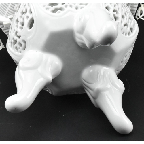 104 - A Chinese Qing Dynasty late 19th / early 20th century blanc de chine glazed ceramic pagoda tripod in... 