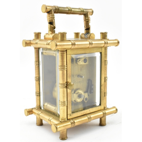 105 - Elliott & Son, London - a Victorian Aesthetic Movement 19th century brass carriage clock. The brass ... 